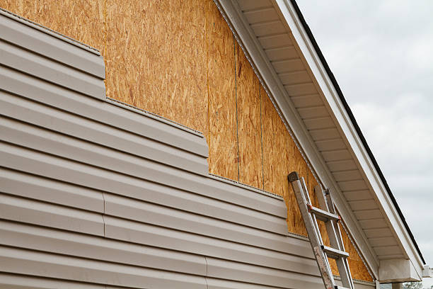 Professional Emergency Siding Repair technician working in Lisbon, OH